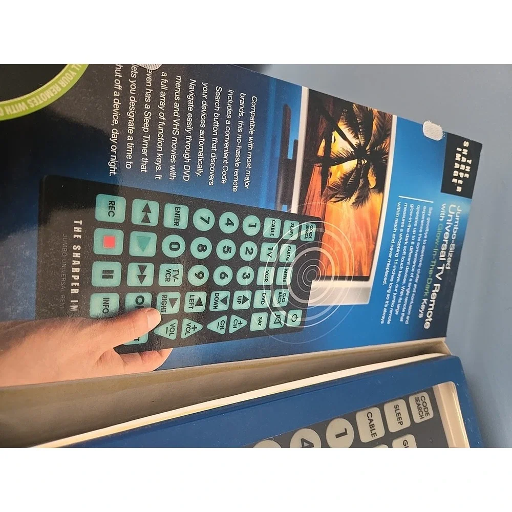 The Sharper Image Jumbo Universal Remote Glow In The Dark Keys‎